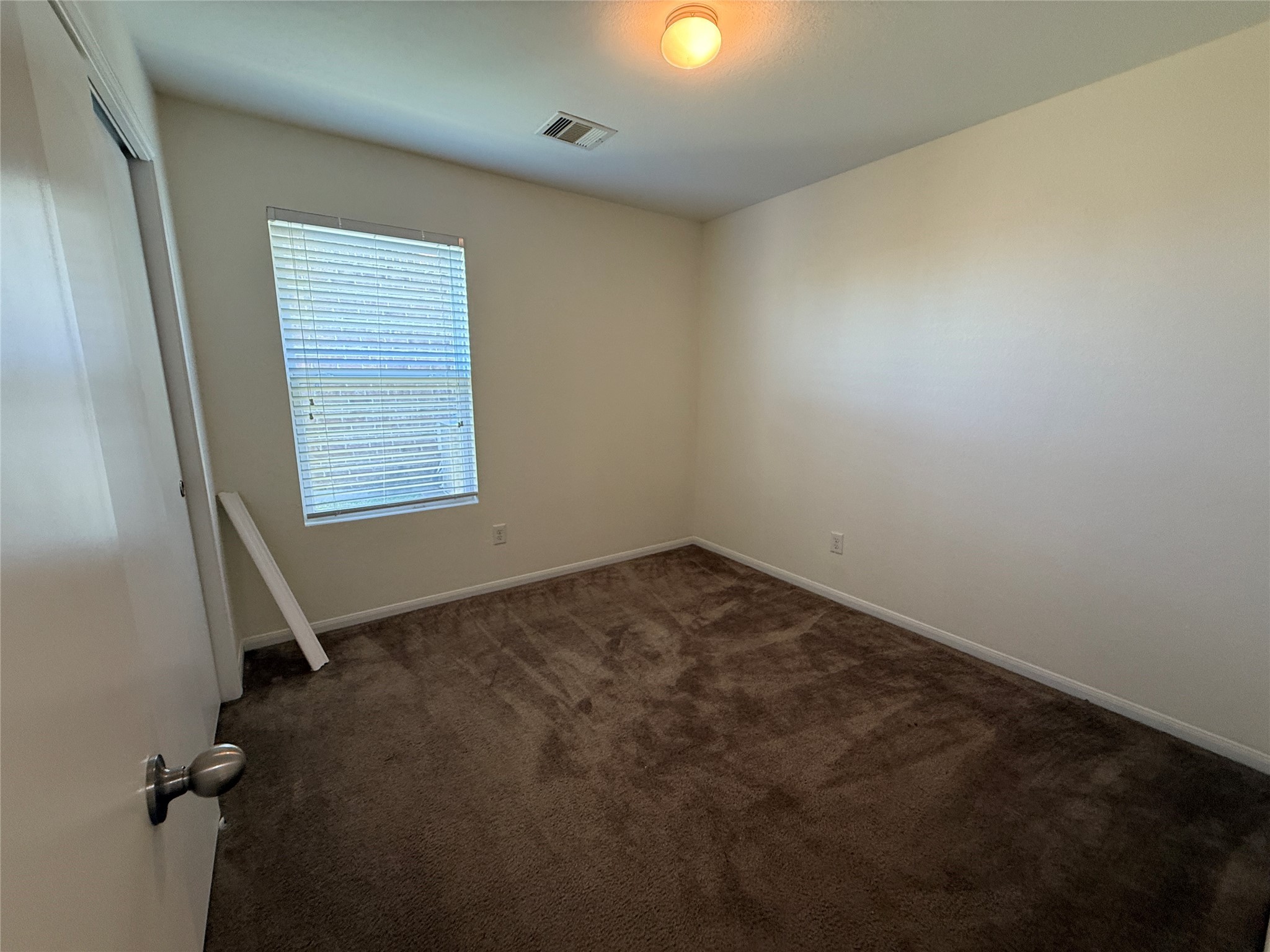 3306 View Valley Trail Katy, TX 77493 - Photo 14 of 19 an empty room with a workbench