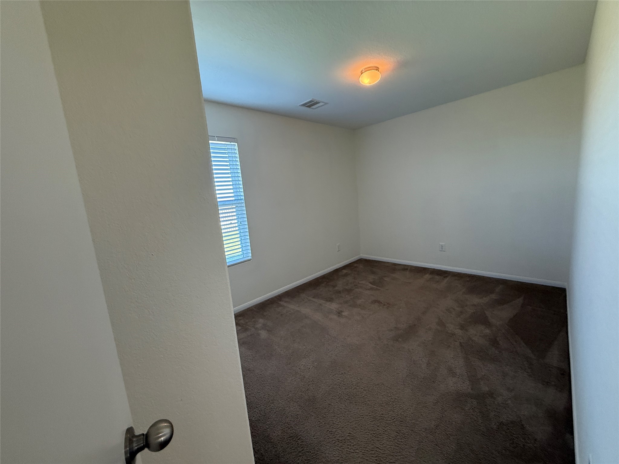 3306 View Valley Trail Katy, TX 77493 - Photo 15 of 19 an empty room with windows