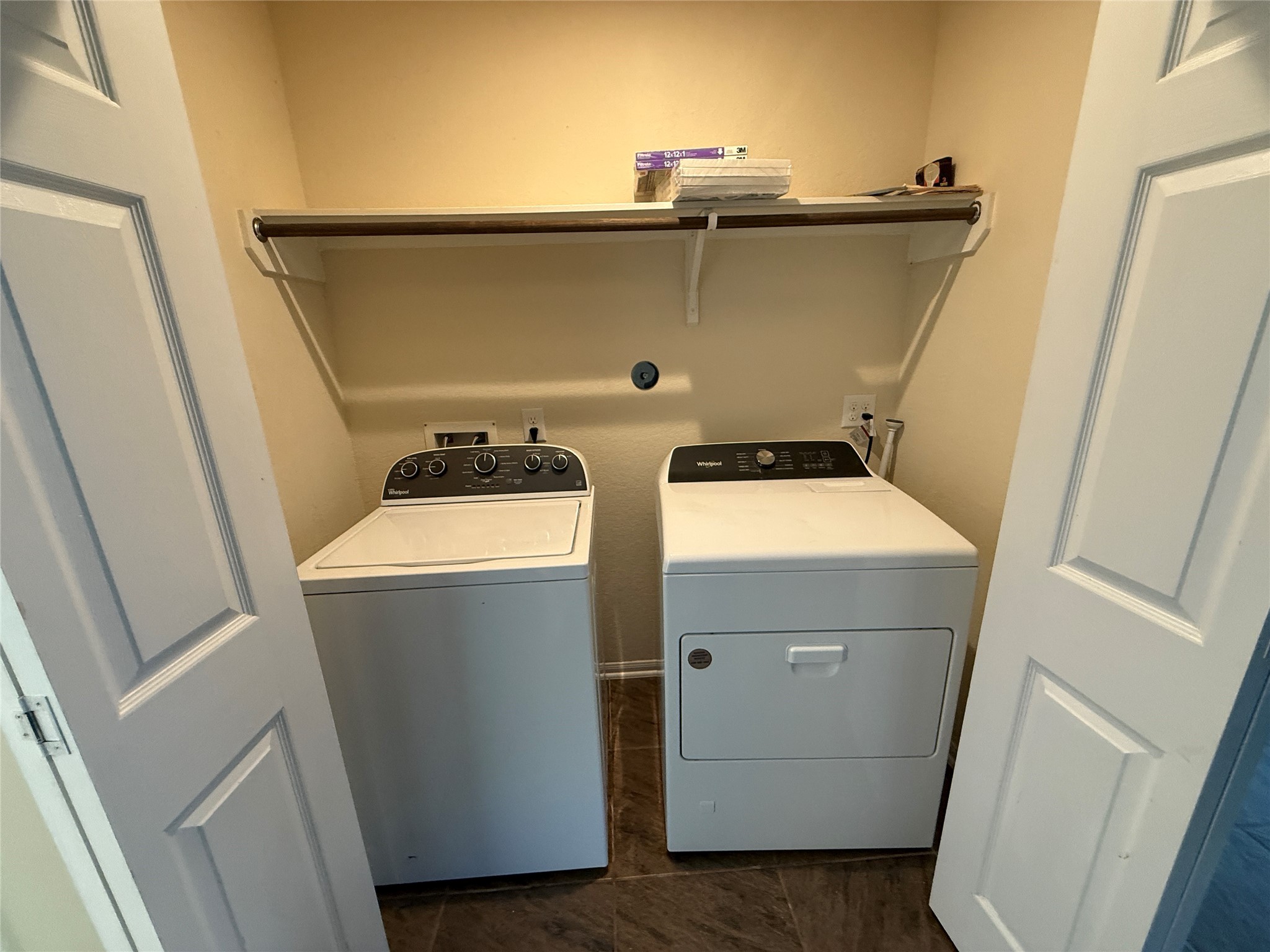 3306 View Valley Trail Katy, TX 77493 - Photo 17 of 19 a utility room with dryer and washer