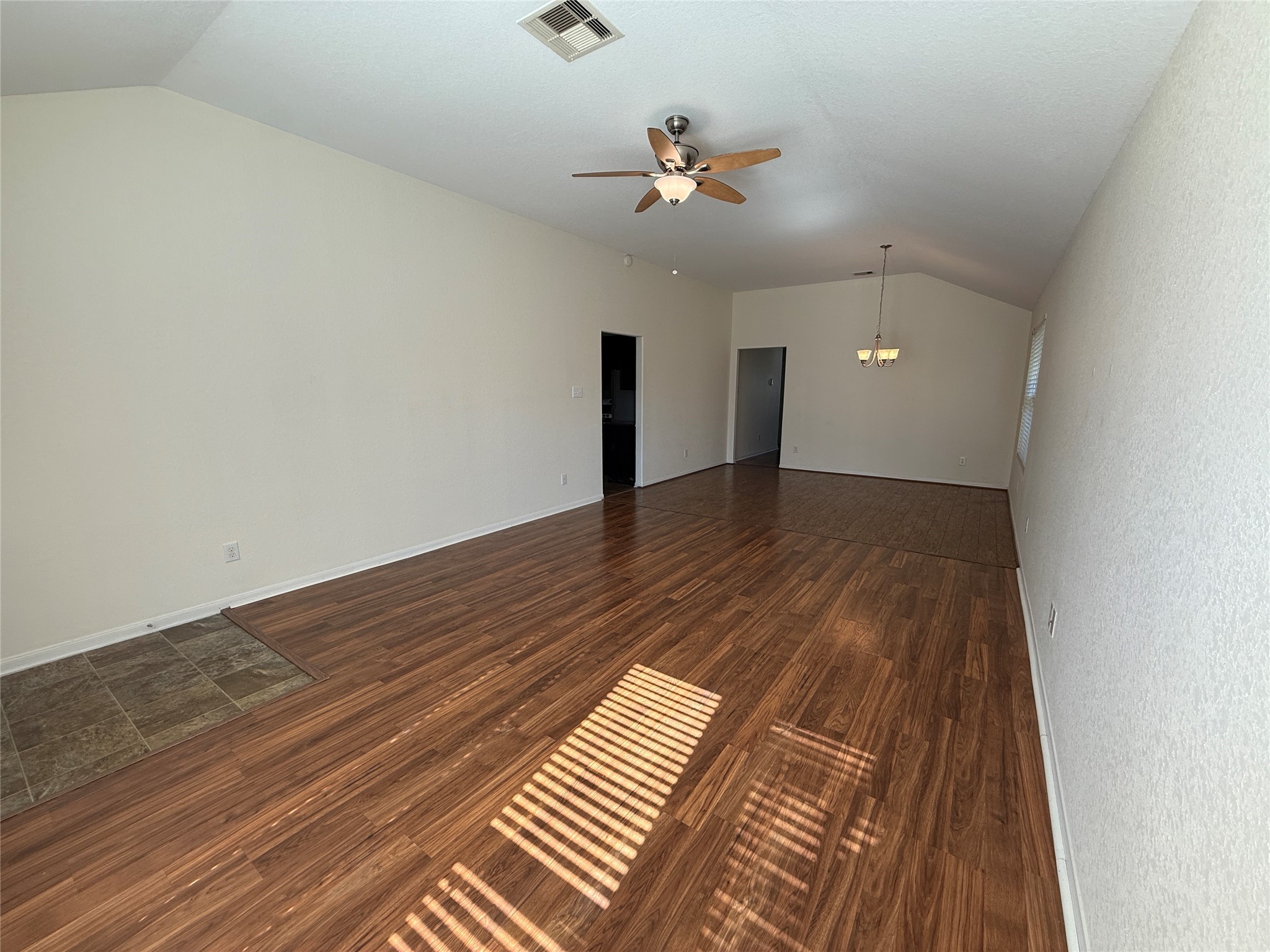 3306 View Valley Trail Katy, TX 77493 - Photo 4 of 19 a view of an empty room with wooden floor
