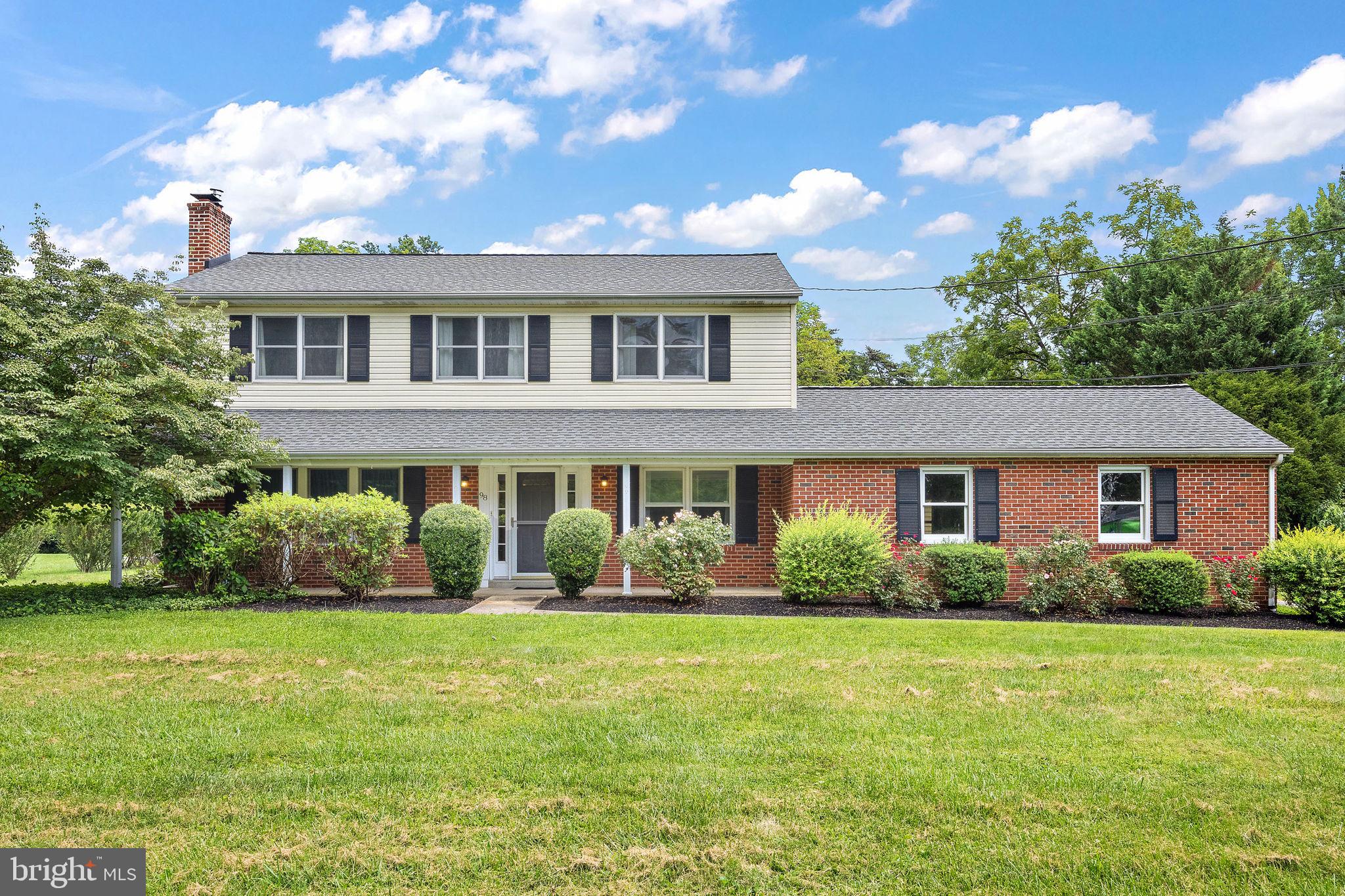 98 Husbands Drive Wilmington, DE 19803 - Photo 1 of 49 a front view of house with yard and green space