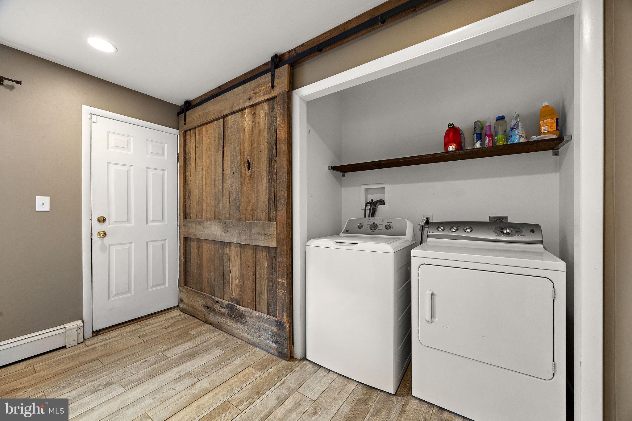 98 Husbands Drive Wilmington, DE 19803 - Photo 16 of 49 a view of storage and utility room with washer and dryer