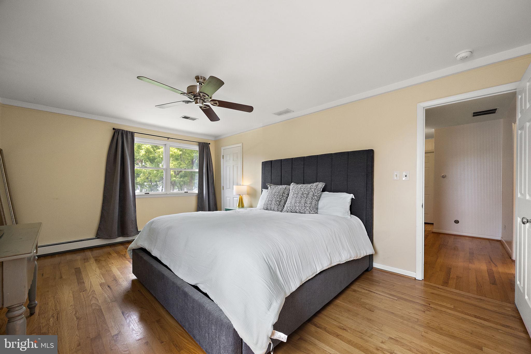 98 Husbands Drive Wilmington, DE 19803 - Photo 19 of 49 a bedroom with a bed and a window