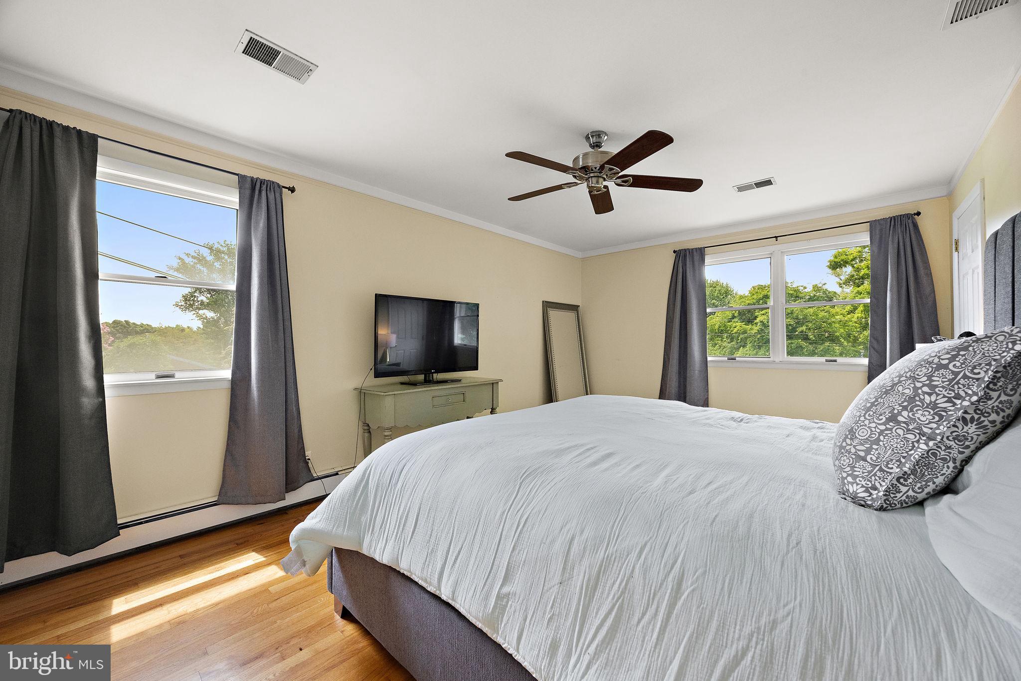 98 Husbands Drive Wilmington, DE 19803 - Photo 20 of 49 a bedroom with a large bed and a window