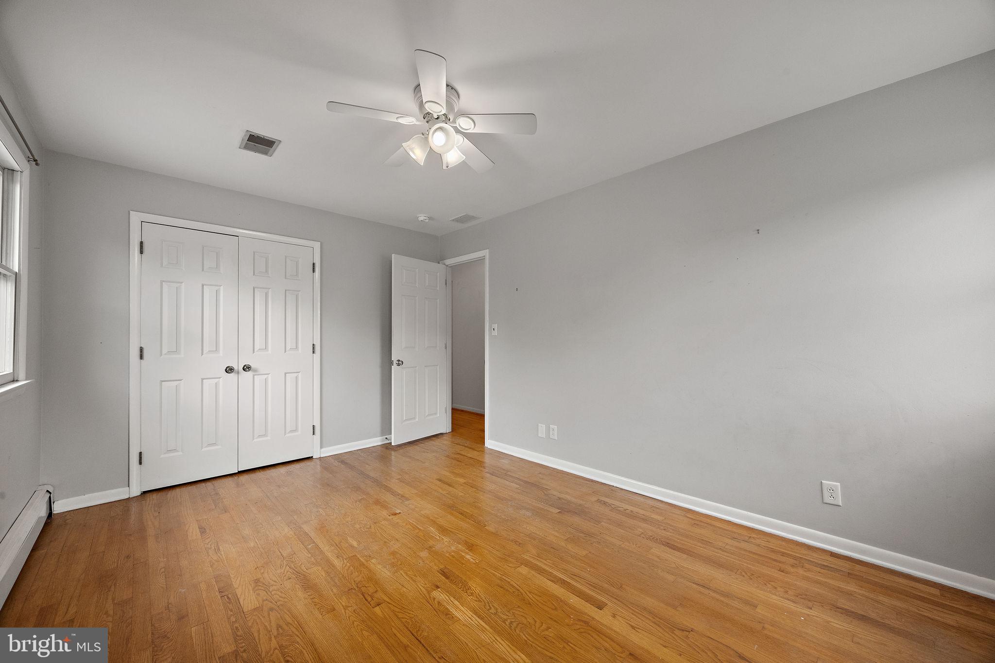 98 Husbands Drive Wilmington, DE 19803 - Photo 32 of 49 a view of an empty room and wooden floor