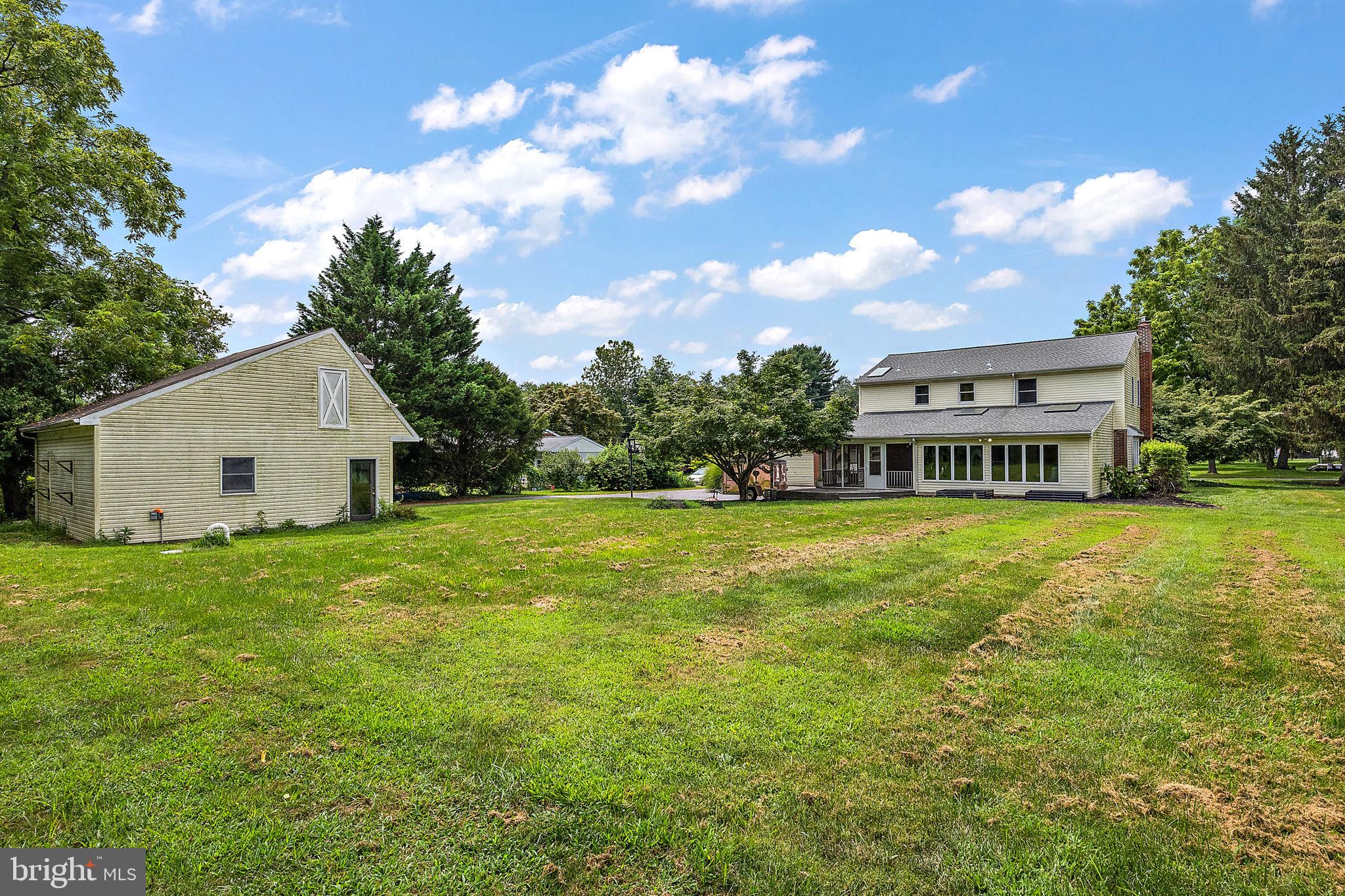 98 Husbands Drive Wilmington, DE 19803 - Photo 41 of 49 a view of a house with a big yard
