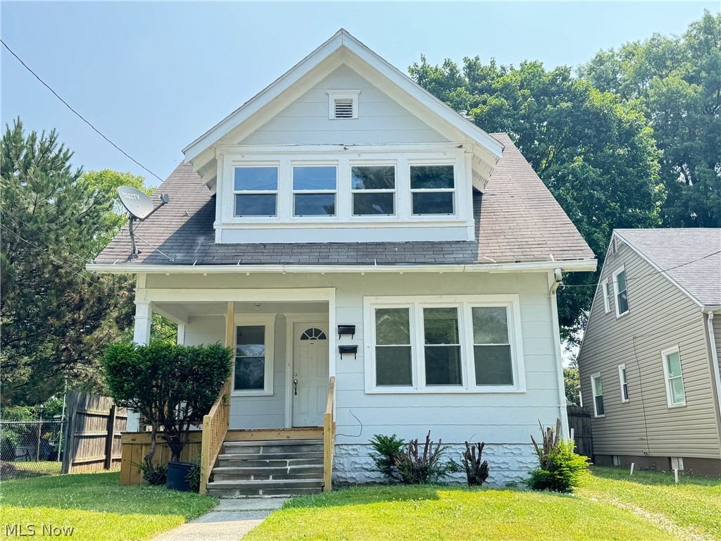 459 Patterson Avenue Akron, OH 44310 - Photo 1 of 24 Bungalow-style home featuring a front yard and covered porch