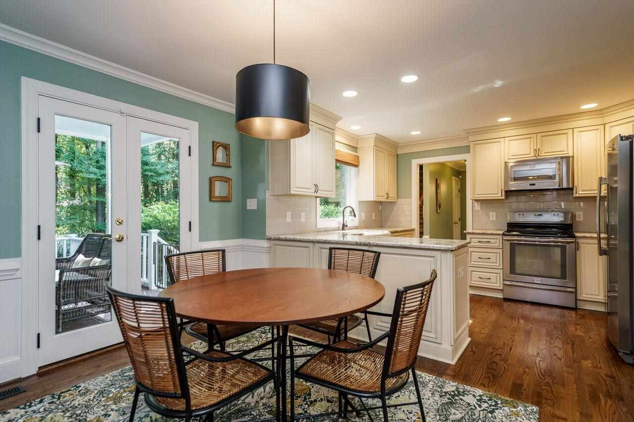 11000 Coachmans Way Raleigh, NC 27614 - Photo 11 of 30 Breakfast Area with new french doors and hardwood floors. Breakfast Area