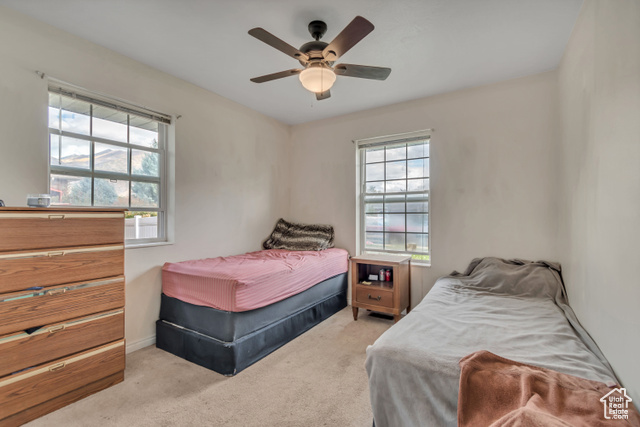1225 North 1380th Street West Mapleton, UT 84664 - Photo 9 of 18 Bedroom featuring light carpet and a ceiling fan