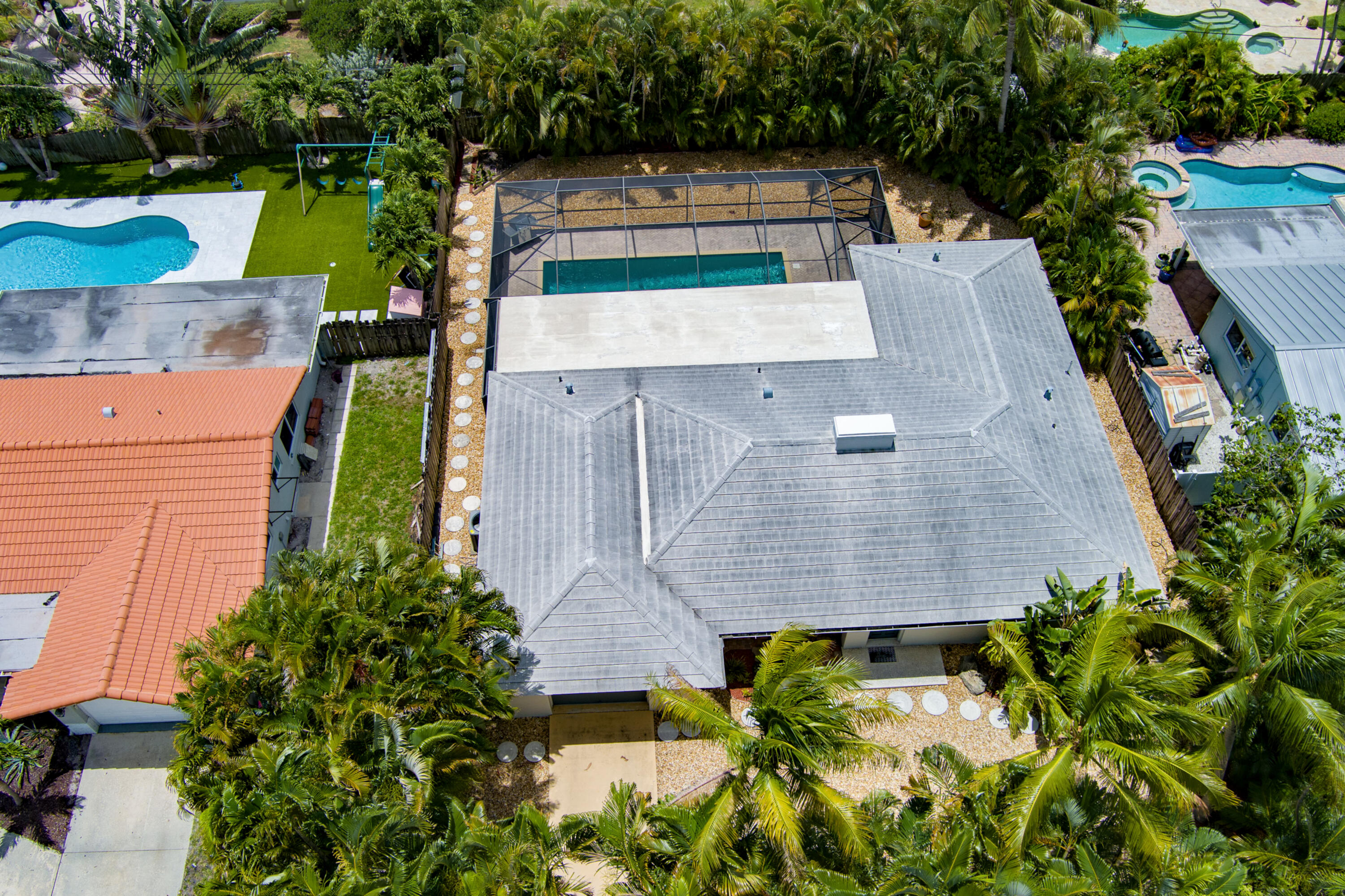 1348 Southwest 4th Street Boca Raton, FL 33486 - Photo 41 of 44 an aerial view of a house with swimming pool and garden