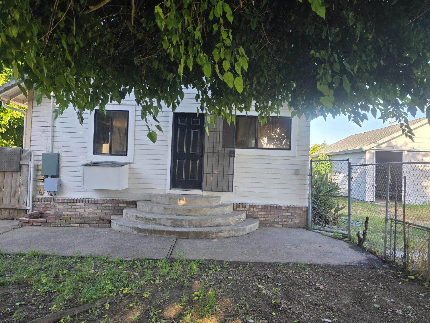 5206 East Jahant Road Acampo, CA 95220 - Photo 15 of 67 Back door of house
