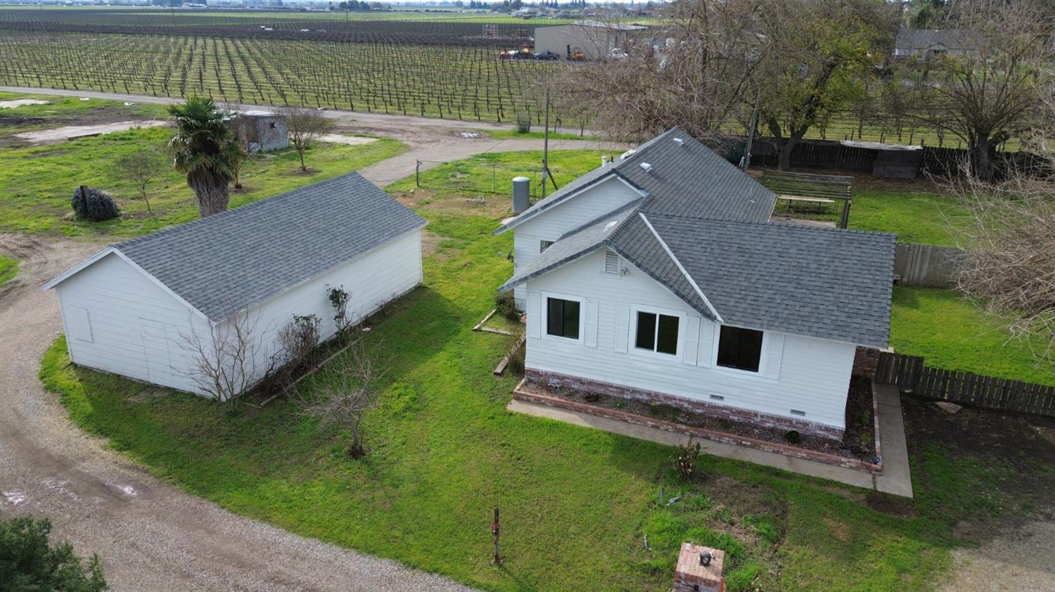 5206 East Jahant Road Acampo, CA 95220 - Photo 2 of 67 Left side of house and barn/garage