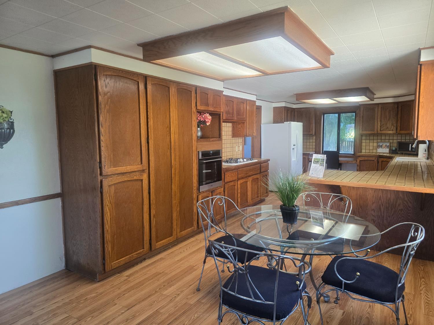 5206 East Jahant Road Acampo, CA 95220 - Photo 57 of 67 Dining to kitchen