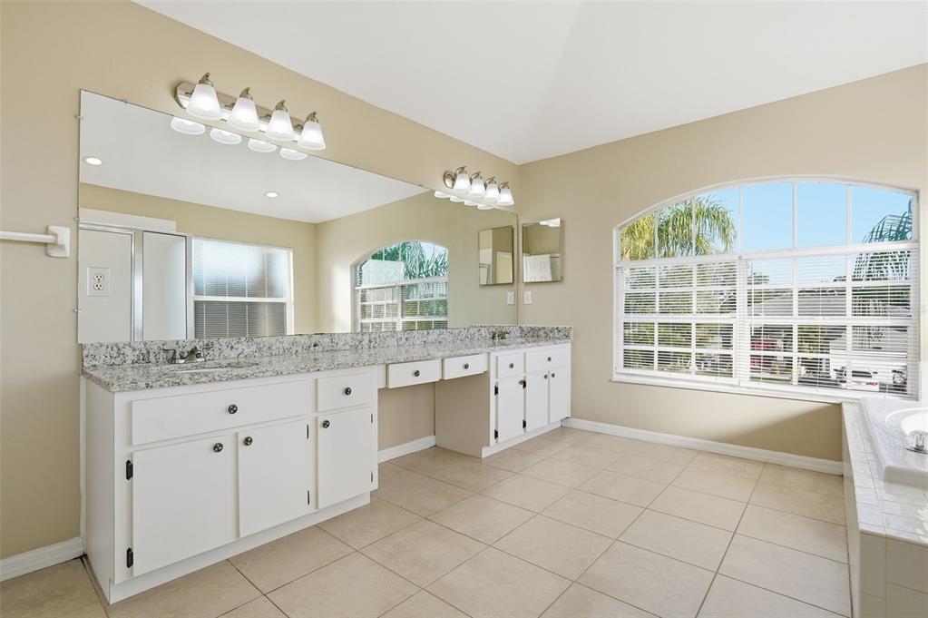 13032 St Filagree Drive Riverview, FL 33579 - Photo 32 of 44 a large white kitchen with a large window