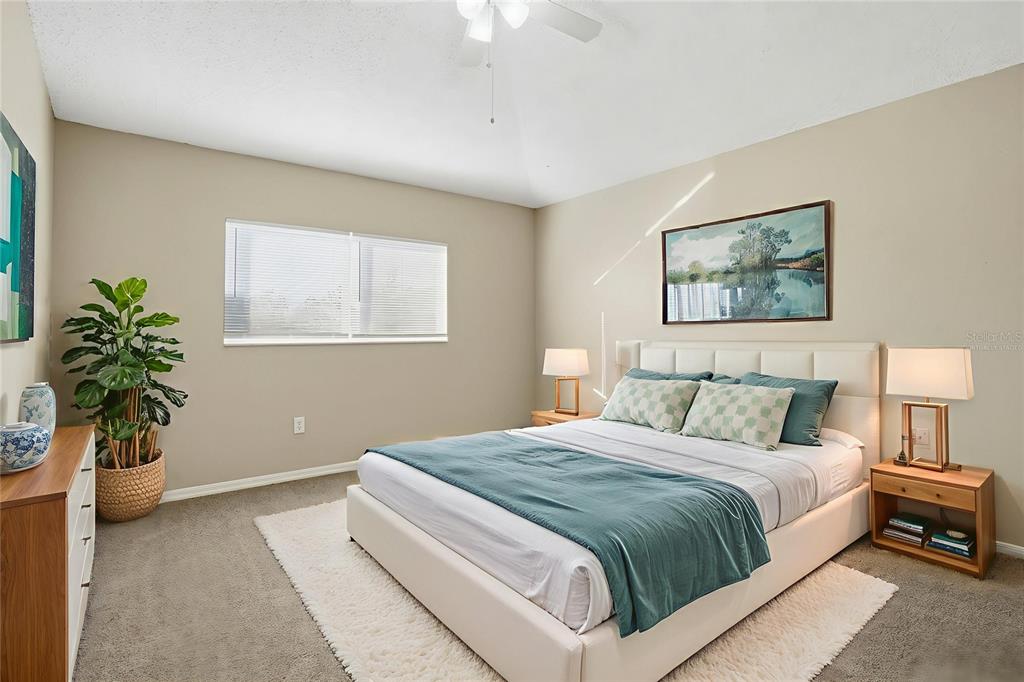 13032 St Filagree Drive Riverview, FL 33579 - Photo 6 of 44 a bedroom with a bed and a potted plant