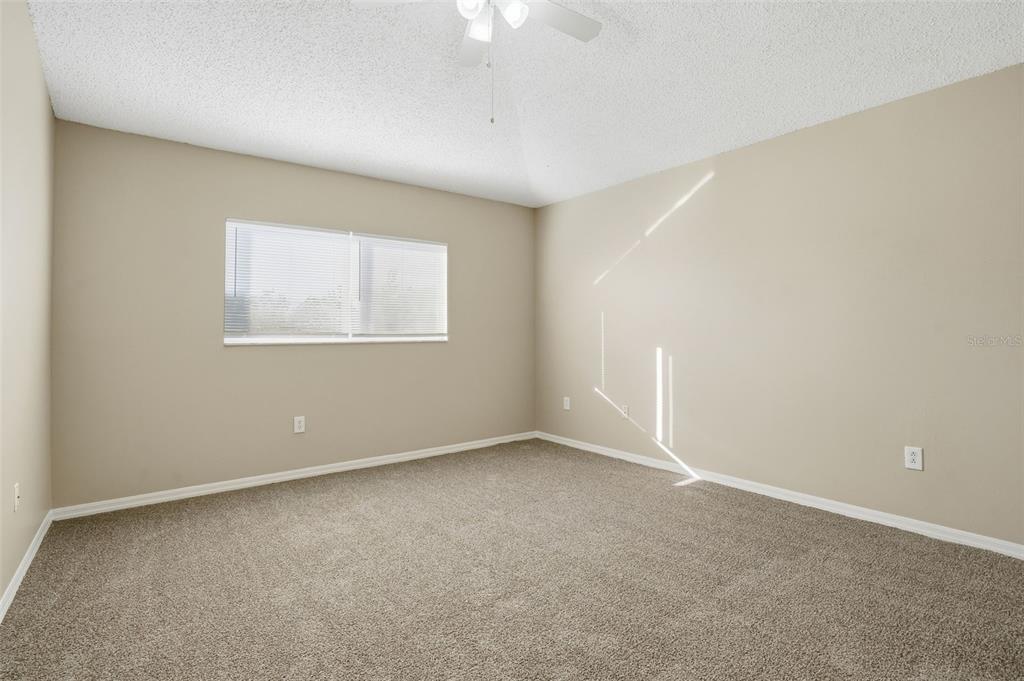 13032 St Filagree Drive Riverview, FL 33579 - Photo 7 of 44 an empty room with a window