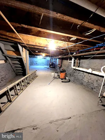 a view of parking garage with cars