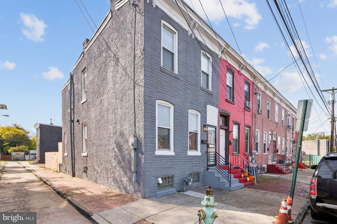 718 Spruce Street Camden, NJ 08103 - Photo 33 of 39 a front view of a building with street view