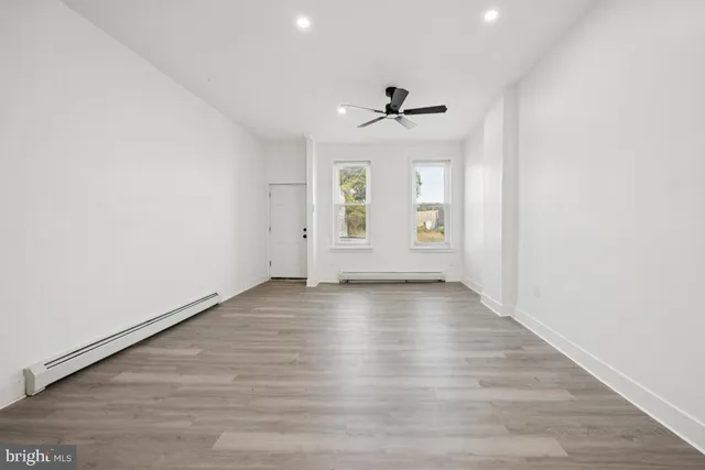 an empty room with windows