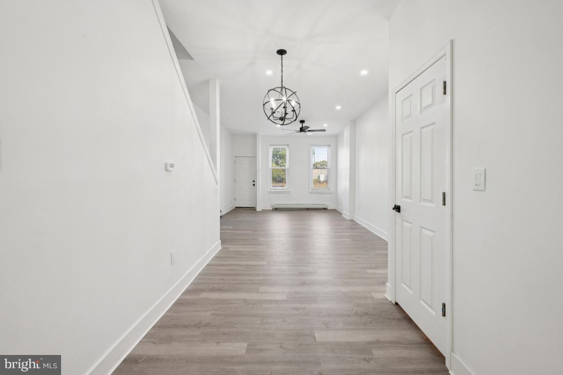 718 Spruce Street Camden, NJ 08103 - Photo 8 of 39 a view of an entryway with wooden floor