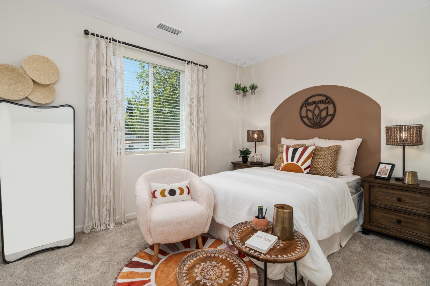 1150 Encore Way West Madera, CA 93636 - Photo 17 of 33 a bedroom with a bed and dresser