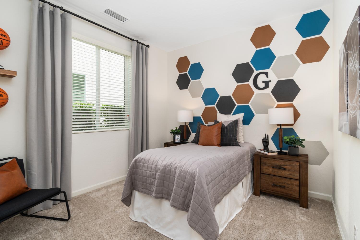 1150 Encore Way West Madera, CA 93636 - Photo 21 of 33 a bedroom with a bed and a window