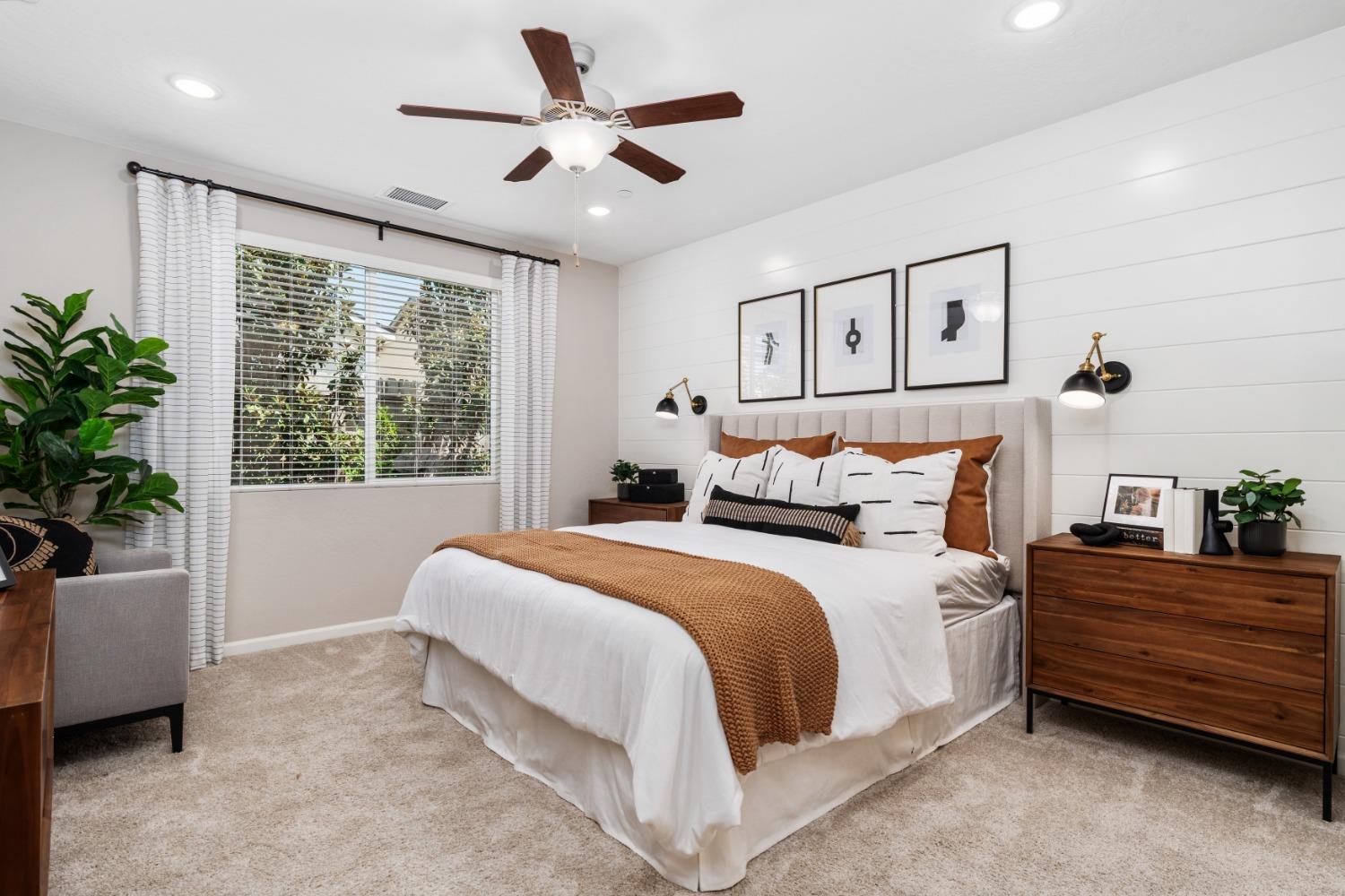 1150 Encore Way West Madera, CA 93636 - Photo 24 of 33 a bed room with a bed and a potted plant