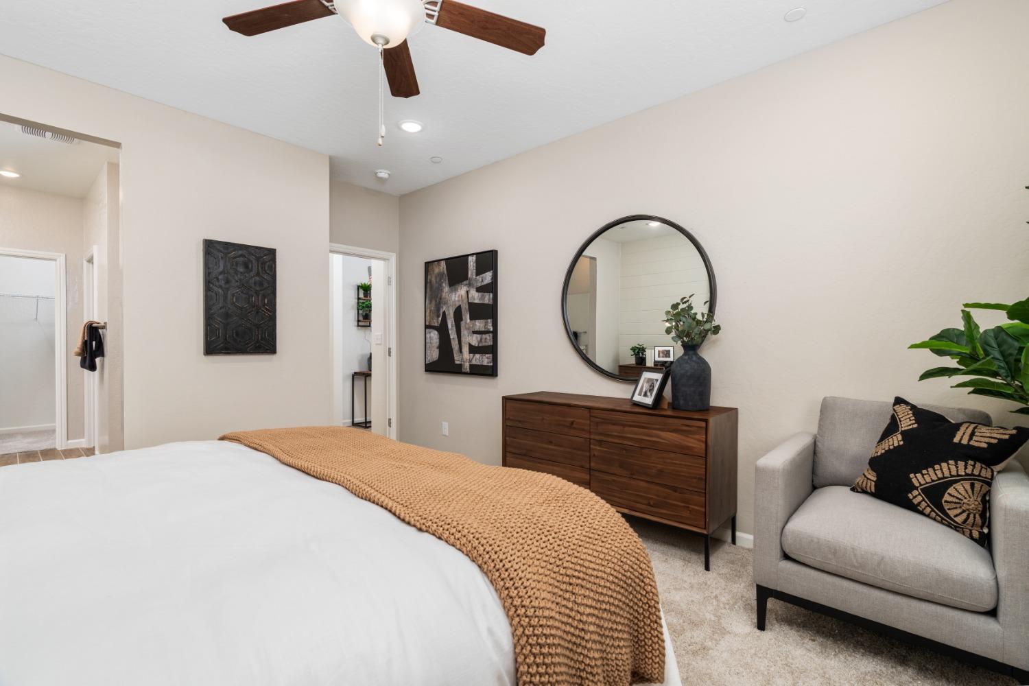 1150 Encore Way West Madera, CA 93636 - Photo 33 of 33 a bedroom with a bed and a dresser
