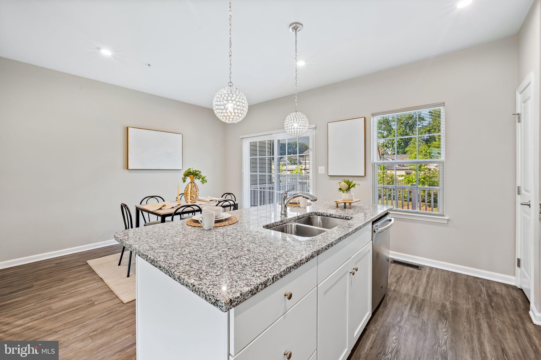8206 Kirk Farm Circle Windsor Mill, MD 21244 - Photo 13 of 35 a kitchen with sink stove and refrigerator