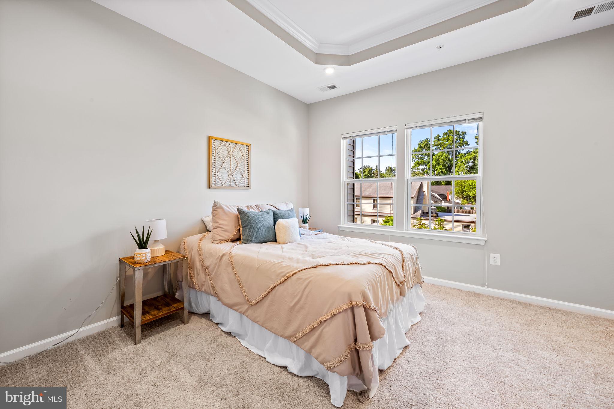 8206 Kirk Farm Circle Windsor Mill, MD 21244 - Photo 24 of 35 a bedroom with a bed and window