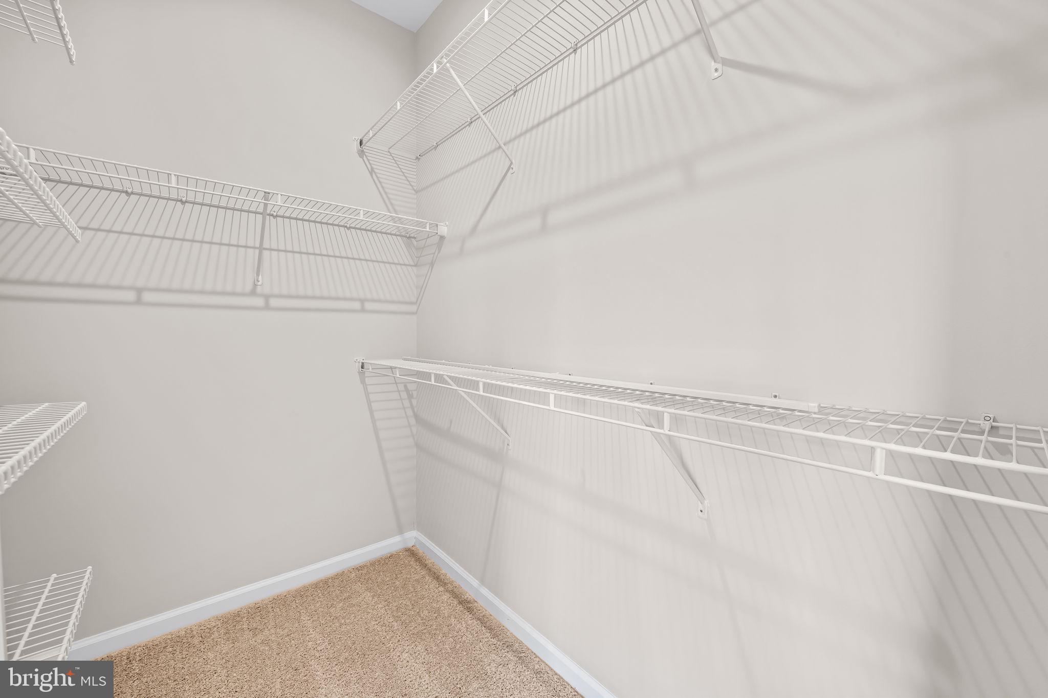 8206 Kirk Farm Circle Windsor Mill, MD 21244 - Photo 29 of 35 a view of a room with racks on the wall