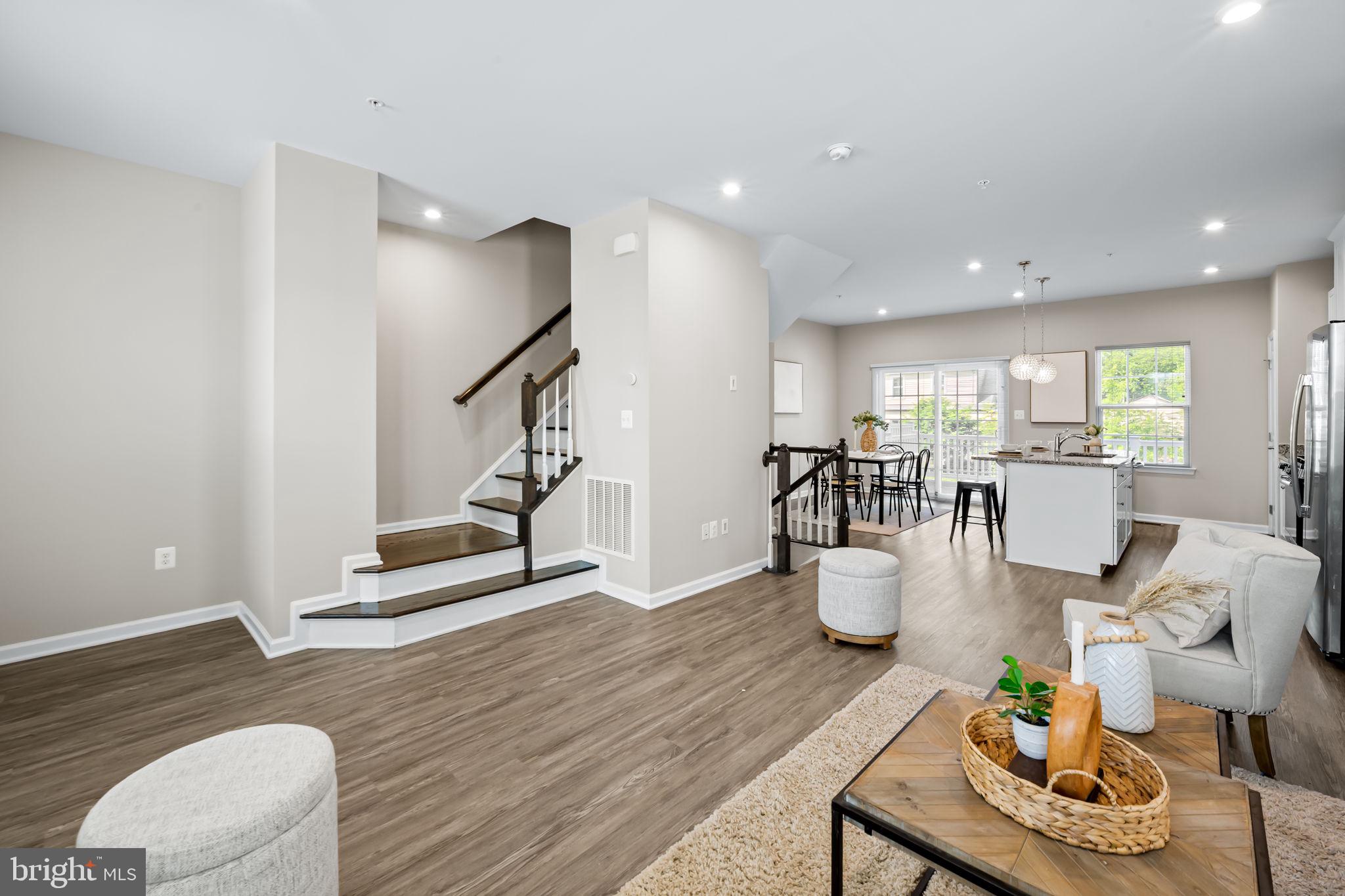 8206 Kirk Farm Circle Windsor Mill, MD 21244 - Photo 3 of 35 a living room with furniture and wooden floor