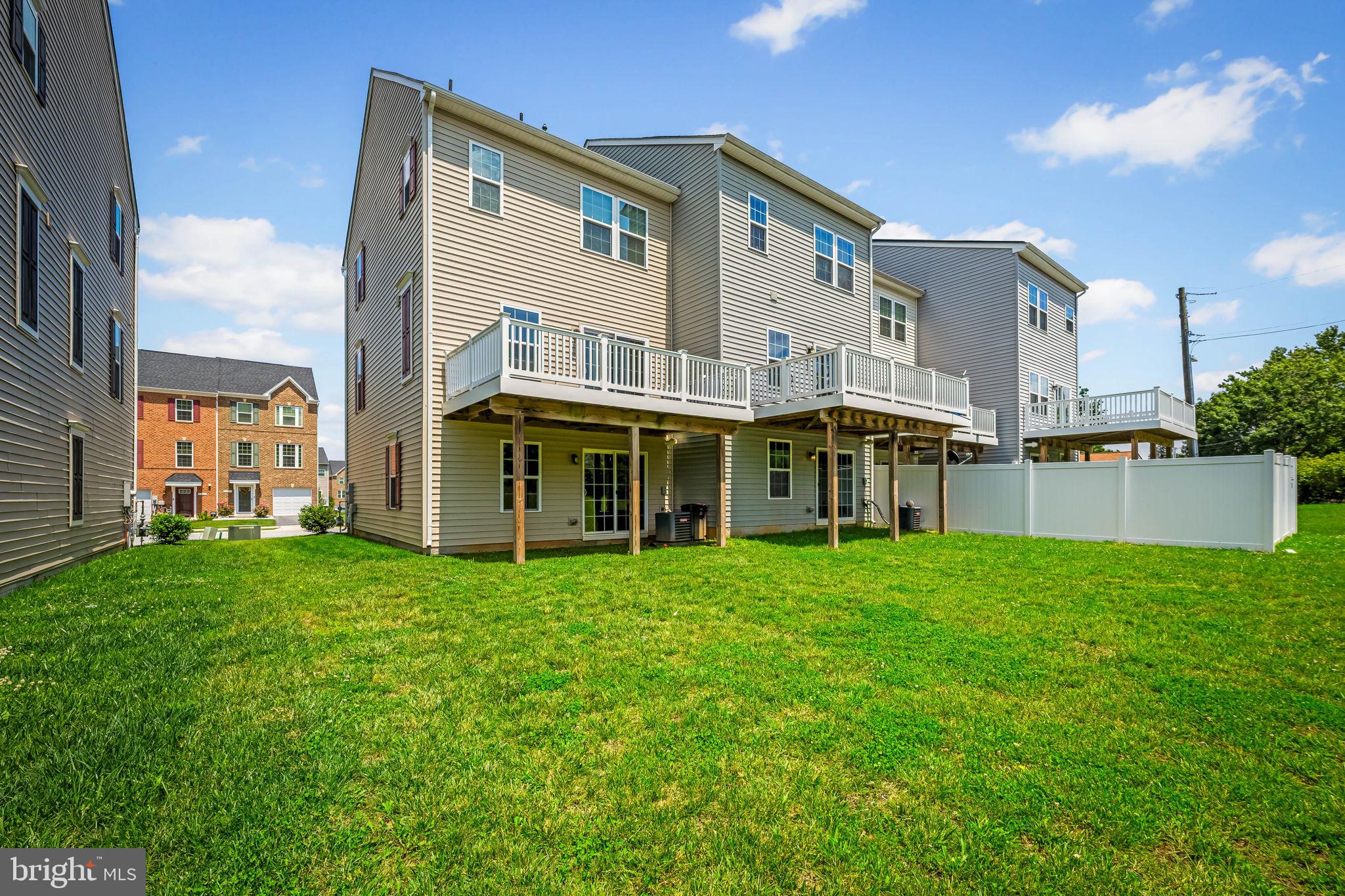 8206 Kirk Farm Circle Windsor Mill, MD 21244 - Photo 31 of 35 a view of an house with backyard porch and garden