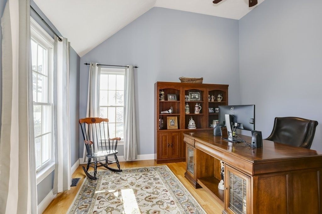 18 Spring Valley Road Hull, MA 02045 - Photo 11 of 30 a view of a workspace with furniture and a window