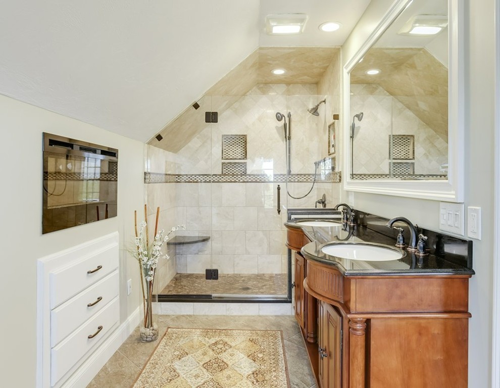 18 Spring Valley Road Hull, MA 02045 - Photo 15 of 30 a bathroom with a double vanity sink a mirror and a shower