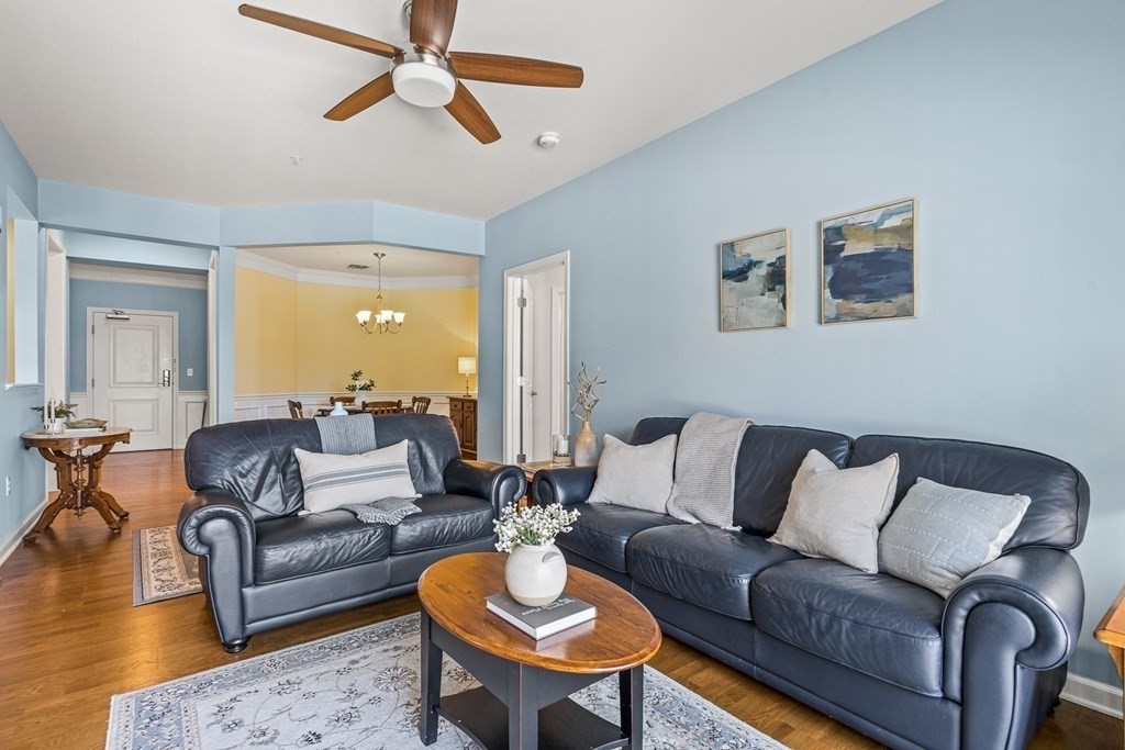 36 Abigail Way, Unit 3009 Reading, MA 01867 - Photo 12 of 36 a living room with furniture and a large window