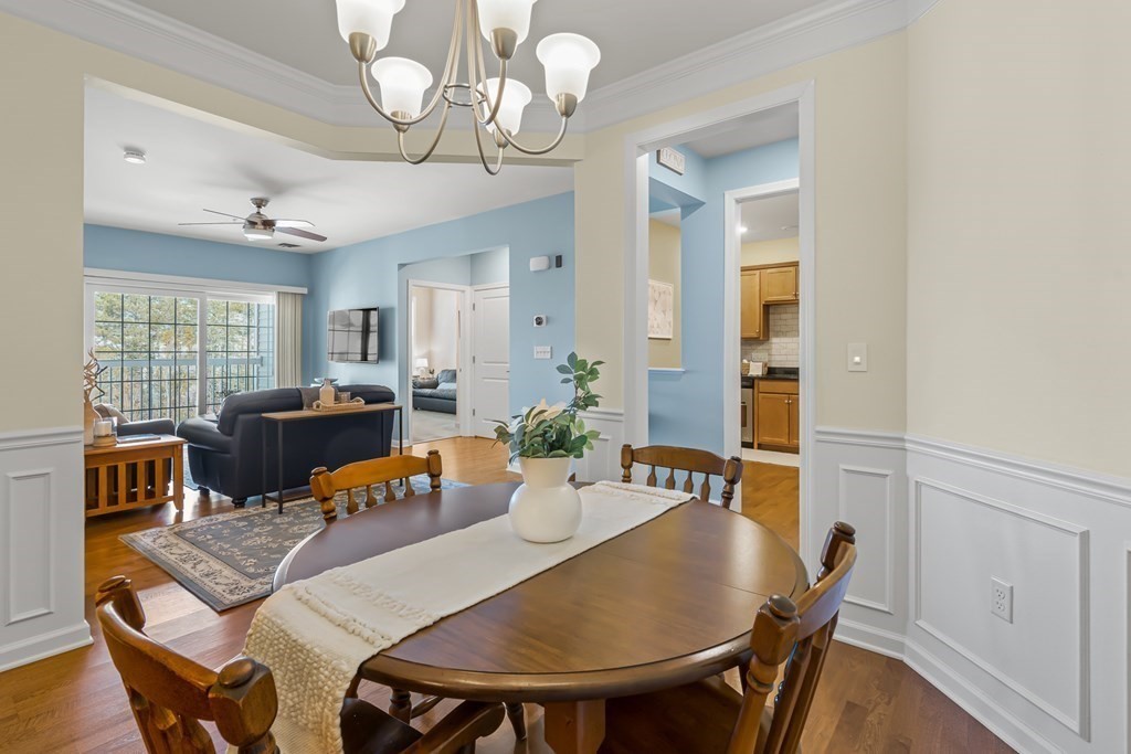 36 Abigail Way, Unit 3009 Reading, MA 01867 - Photo 16 of 36 a view of a dining room with furniture window and wooden floor