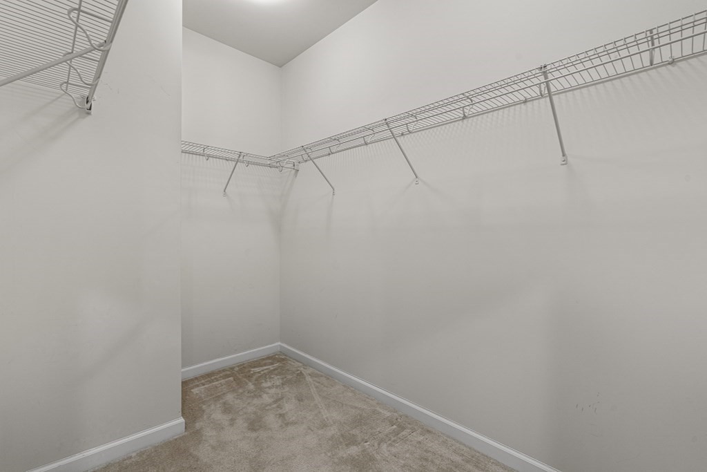 36 Abigail Way, Unit 3009 Reading, MA 01867 - Photo 24 of 36 a view of a room with racks on the wall