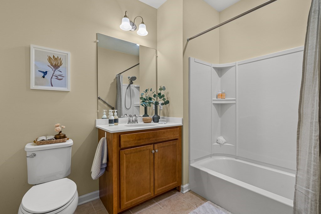 36 Abigail Way, Unit 3009 Reading, MA 01867 - Photo 28 of 36 a bathroom with a sink a toilet and a bathtub