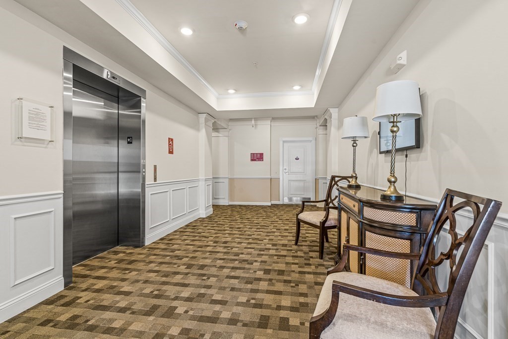 36 Abigail Way, Unit 3009 Reading, MA 01867 - Photo 31 of 36 a living room with stainless steel appliances furniture a refrigerator and a sink