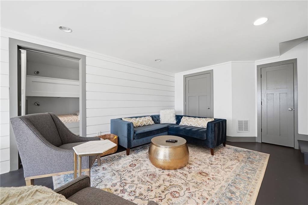 1810 Kilough Church Road Dawsonville, GA 30534 - Photo 14 of 29 a living room with furniture and a wooden floor