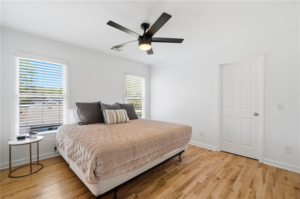 1810 Kilough Church Road Dawsonville, GA 30534 - Photo 15 of 29 a bedroom with a bed and window