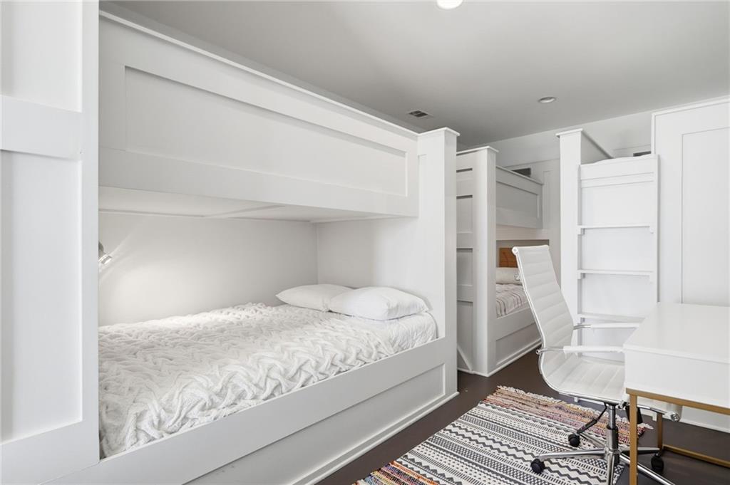 1810 Kilough Church Road Dawsonville, GA 30534 - Photo 22 of 29 a bedroom with a bed and a window