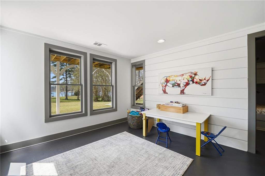 1810 Kilough Church Road Dawsonville, GA 30534 - Photo 24 of 29 a living room with furniture and a window