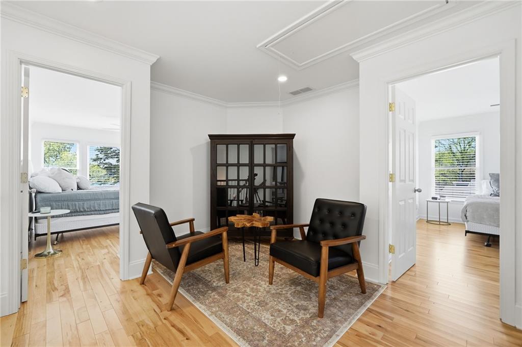 1810 Kilough Church Road Dawsonville, GA 30534 - Photo 26 of 29 a living room with furniture and a wooden floor
