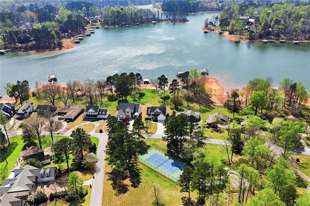 1810 Kilough Church Road Dawsonville, GA 30534 - Photo 27 of 29 an aerial view of residential houses with outdoor space and lake view