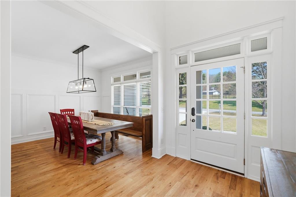1810 Kilough Church Road Dawsonville, GA 30534 - Photo 10 of 29 a view of a dining room with furniture window and wooden floor