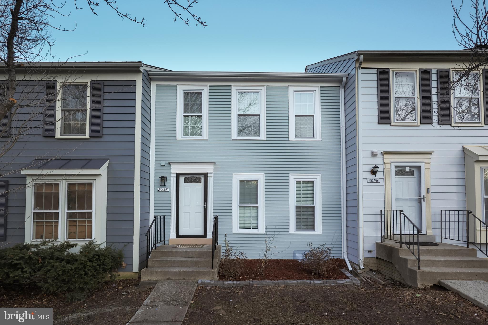 8058 Felecity Court Springfield, VA 22153 - Photo 1 of 35 a front view of a house with a yard