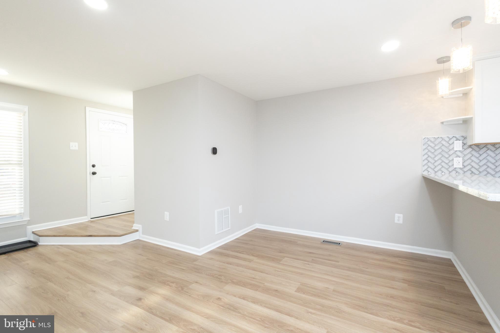 8058 Felecity Court Springfield, VA 22153 - Photo 12 of 35 a view of a room with wooden floor and bathroom