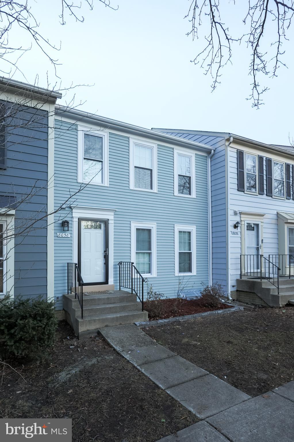 8058 Felecity Court Springfield, VA 22153 - Photo 2 of 35 a front view of a house with a yard